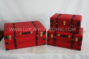 Red Ottoman Trunk box with brown belt detailing